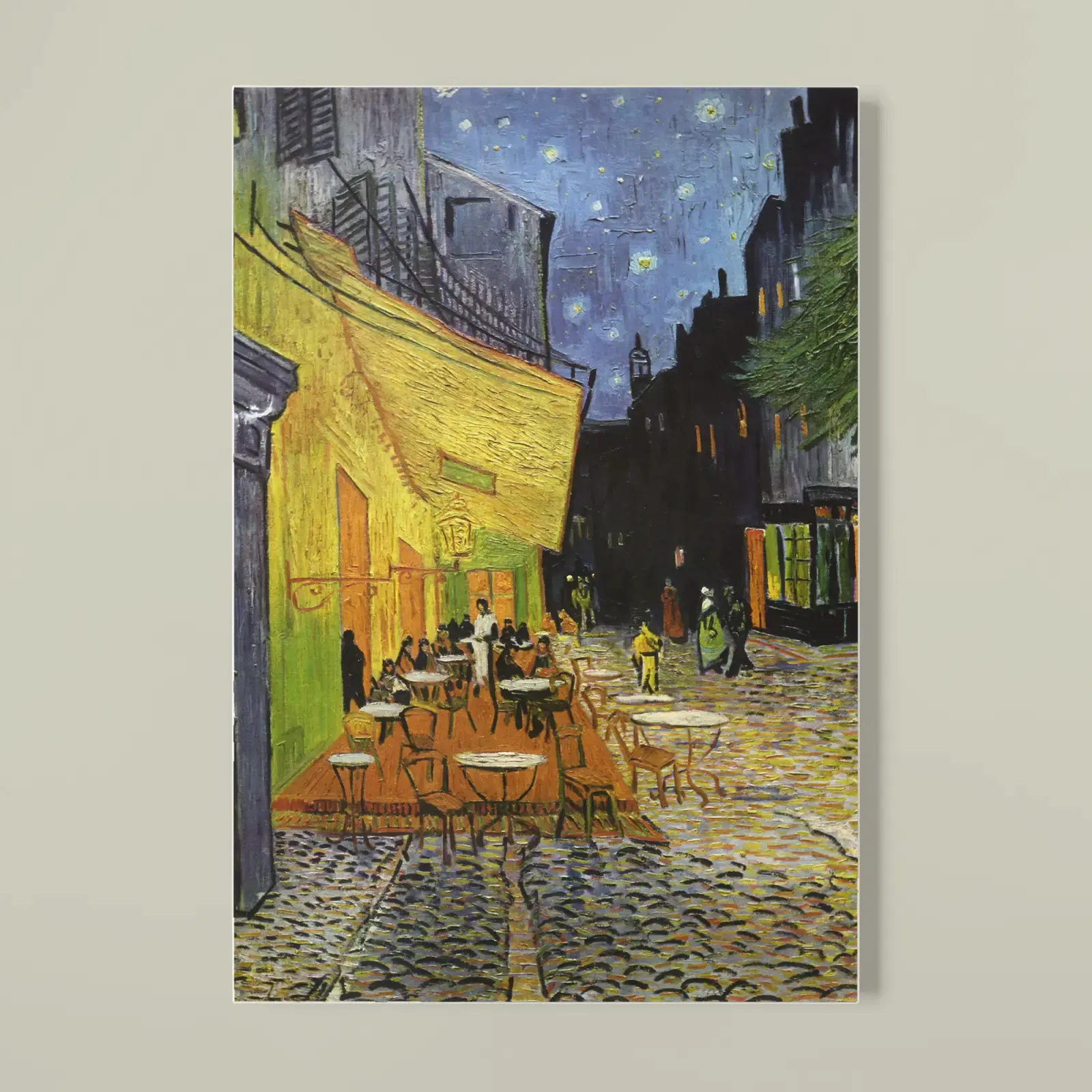 Softcover notebook shown with Café Terrace at Night by Vincent van Gogh, a public-domain example