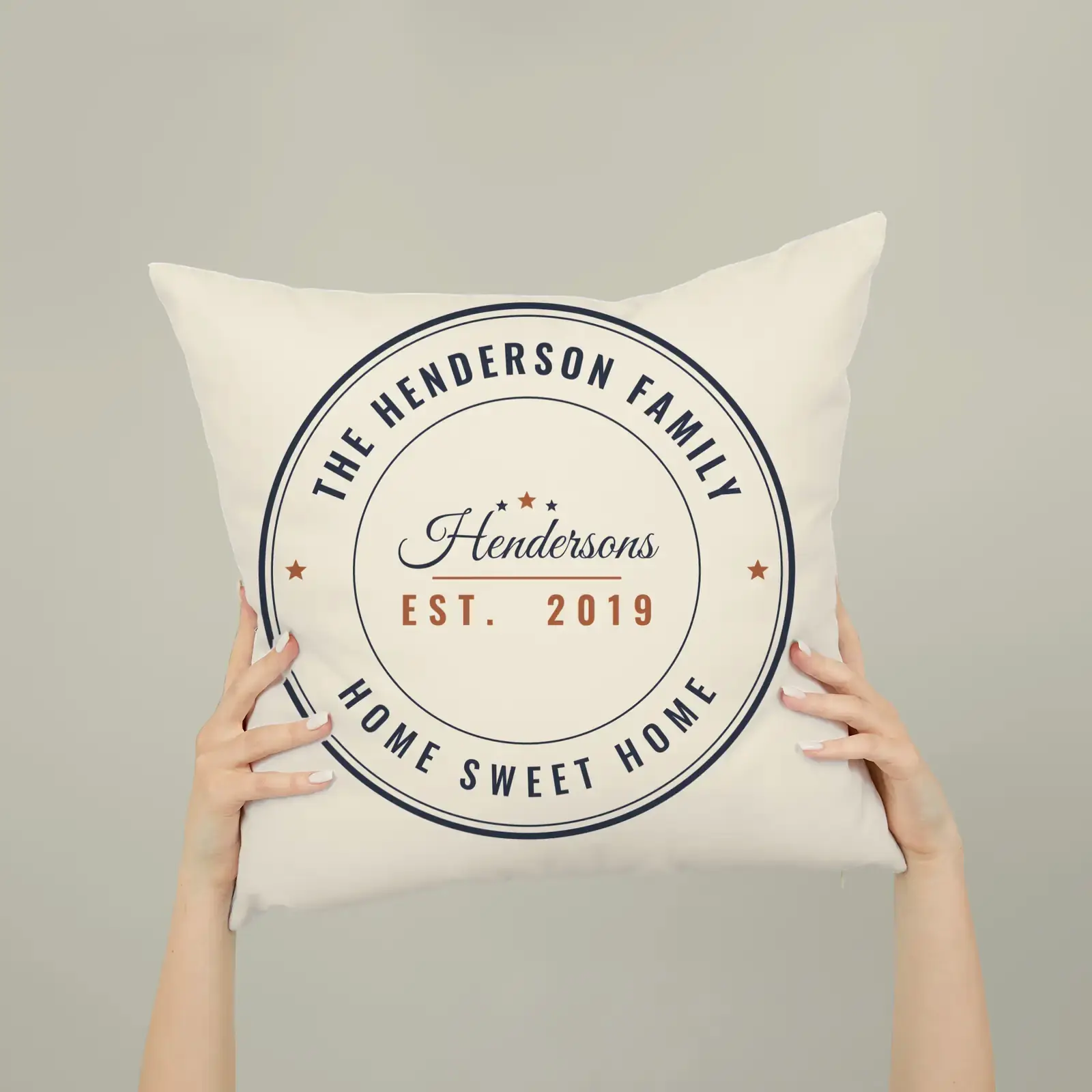 "The Hendersons, Est. 2019", an example design by Vessim, printed on a square pillow