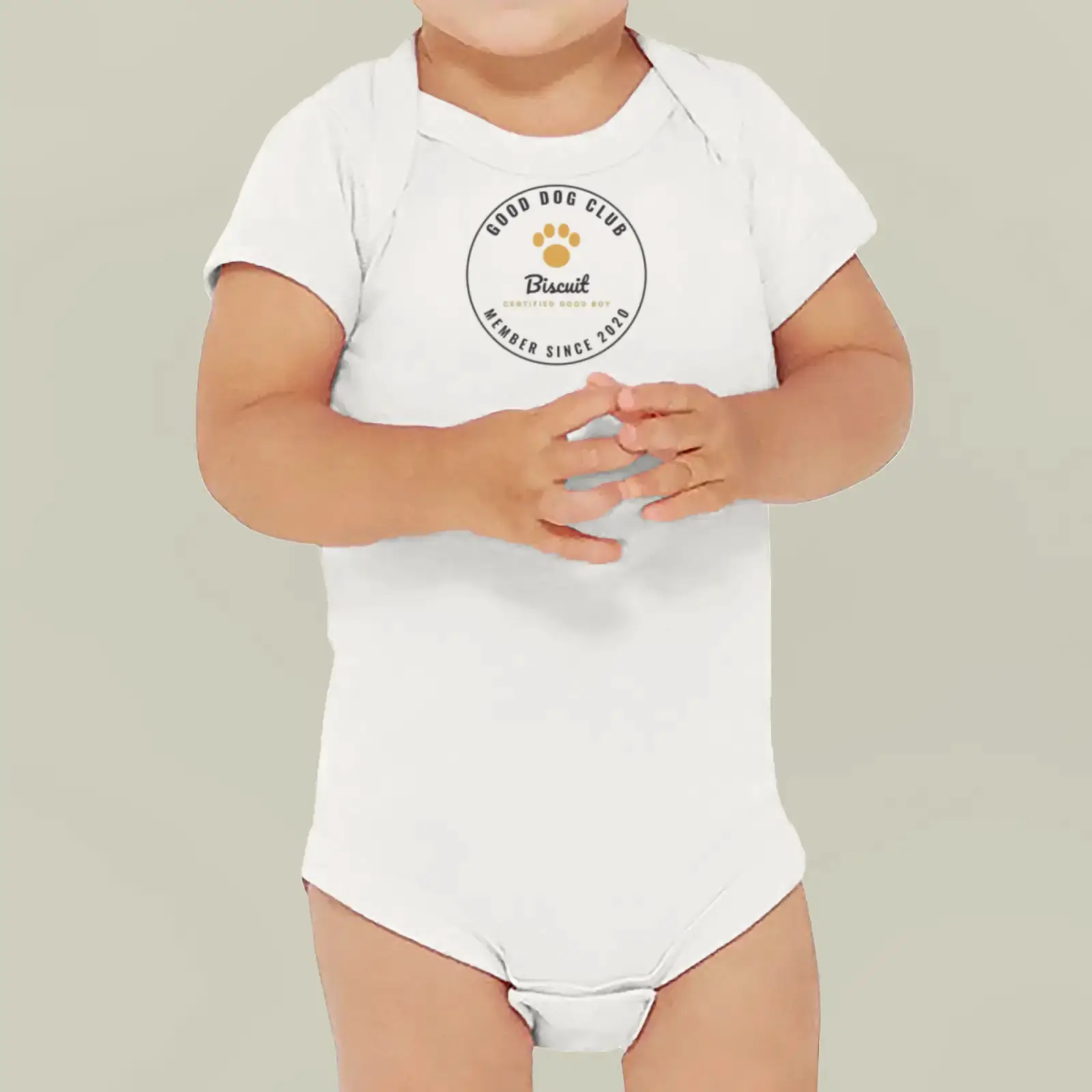 "Good Dog Club: Biscuit", an example design by Vessim, printed on a baby bodysuit