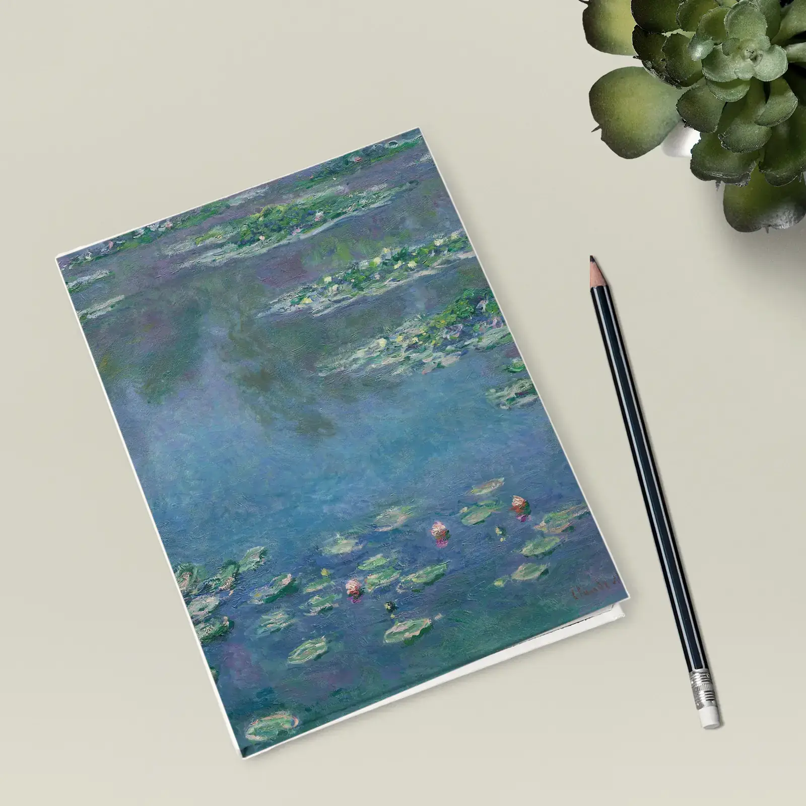 Water Lilies by Claude Monet, printed on a hardcover journal